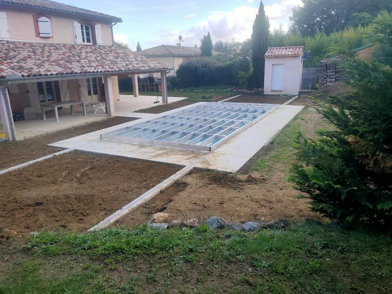 Réalisation d'une terrasse coulissante mobile sur la commune de Merville